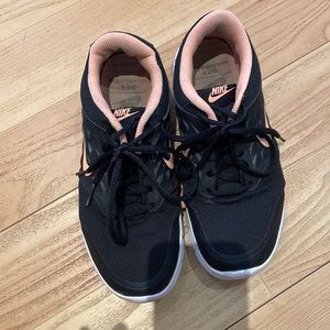 Nike size 7 - black and pink running shoe - well worn but no damage